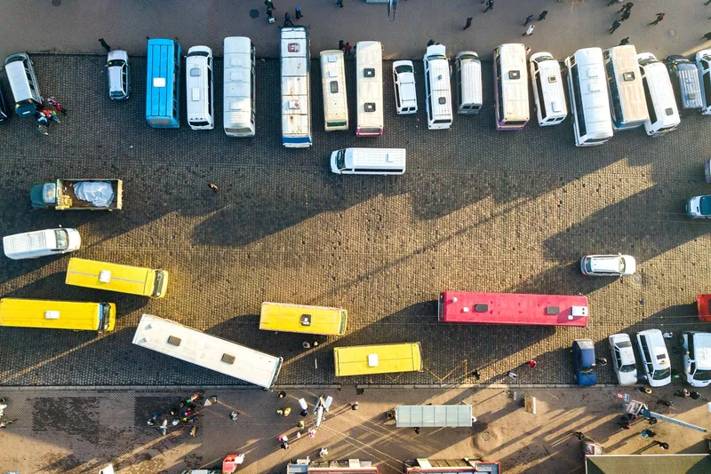 Aerial view of buses and minibuses at a transport terminal